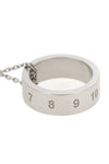 maison margielas numeric necklace presents a minimalist interpretation of the