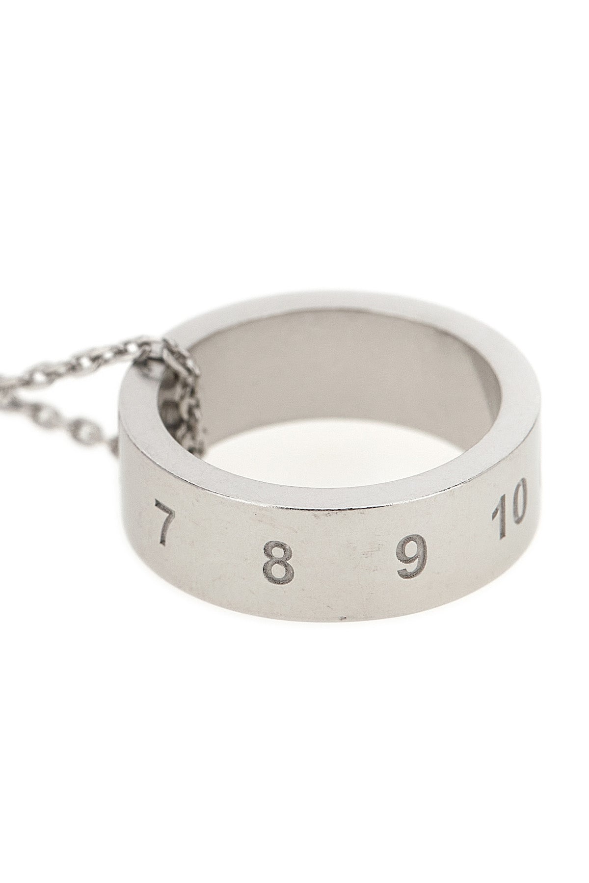 maison margielas numeric necklace presents a minimalist interpretation of the
