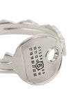 metal key-shaped bangle