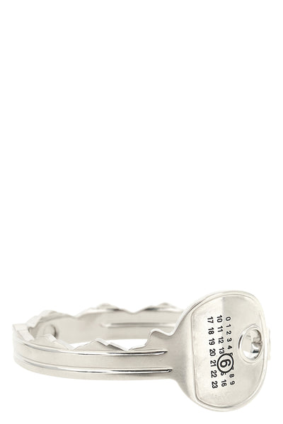 metal key-shaped bangle