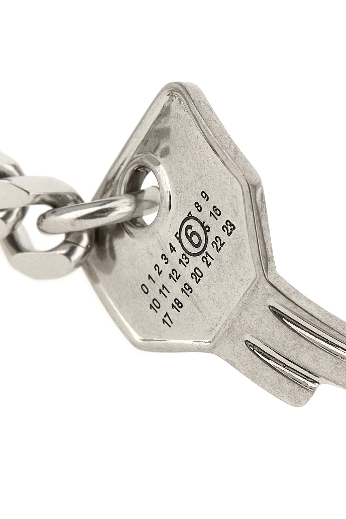 the maison margiela key mm6 bracelet redefines everyday objects through a cuttin