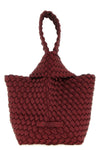 the naghedi kyoto clutch stands out for its meticulous hand-woven workmanship