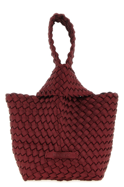 the naghedi kyoto clutch stands out for its meticulous hand-woven workmanship