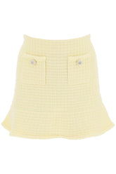 "knitted mini skirt with jewel buttons