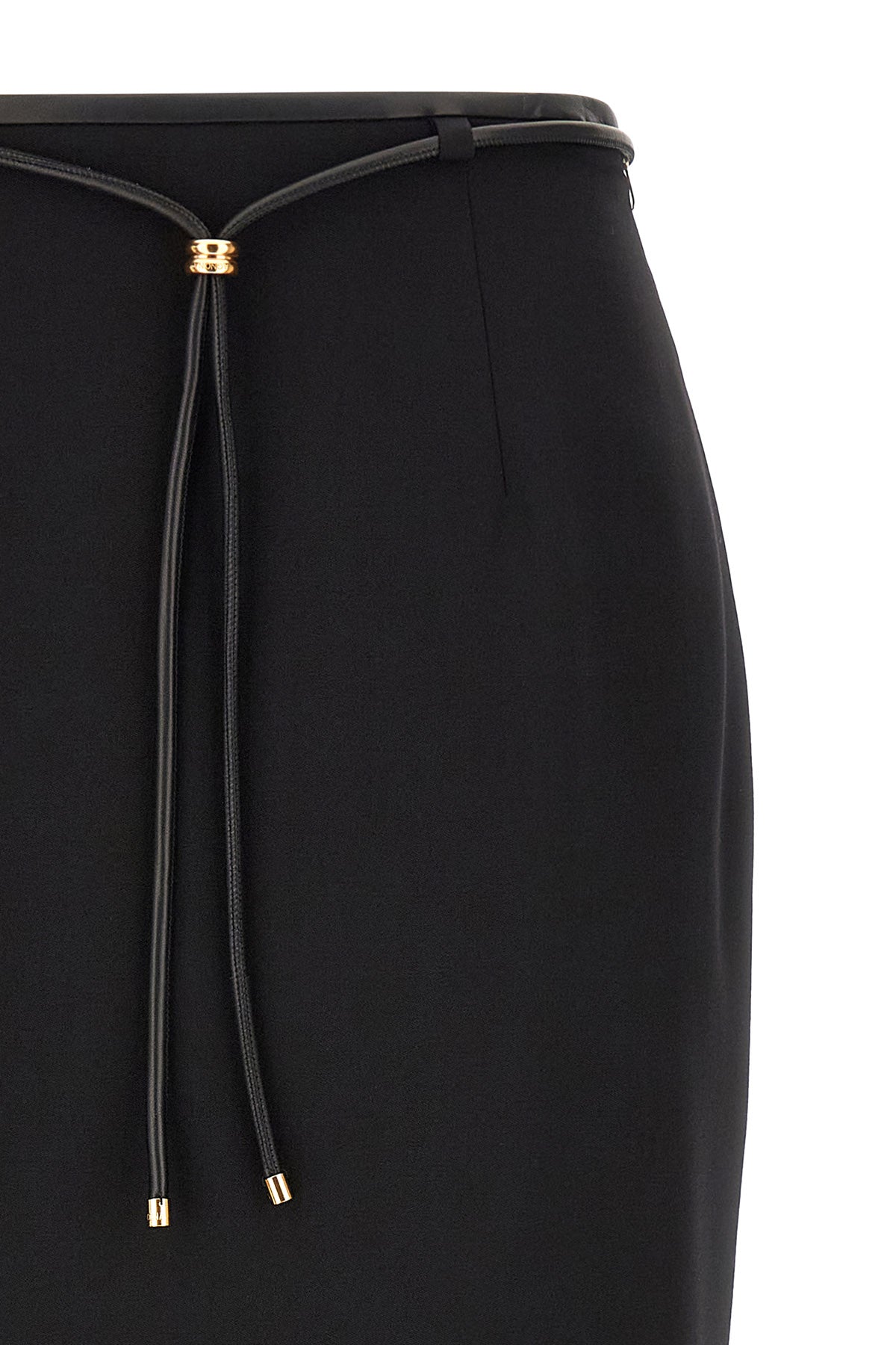 the agnona longuette skirt defines an essential silhouette through a rigorous hi