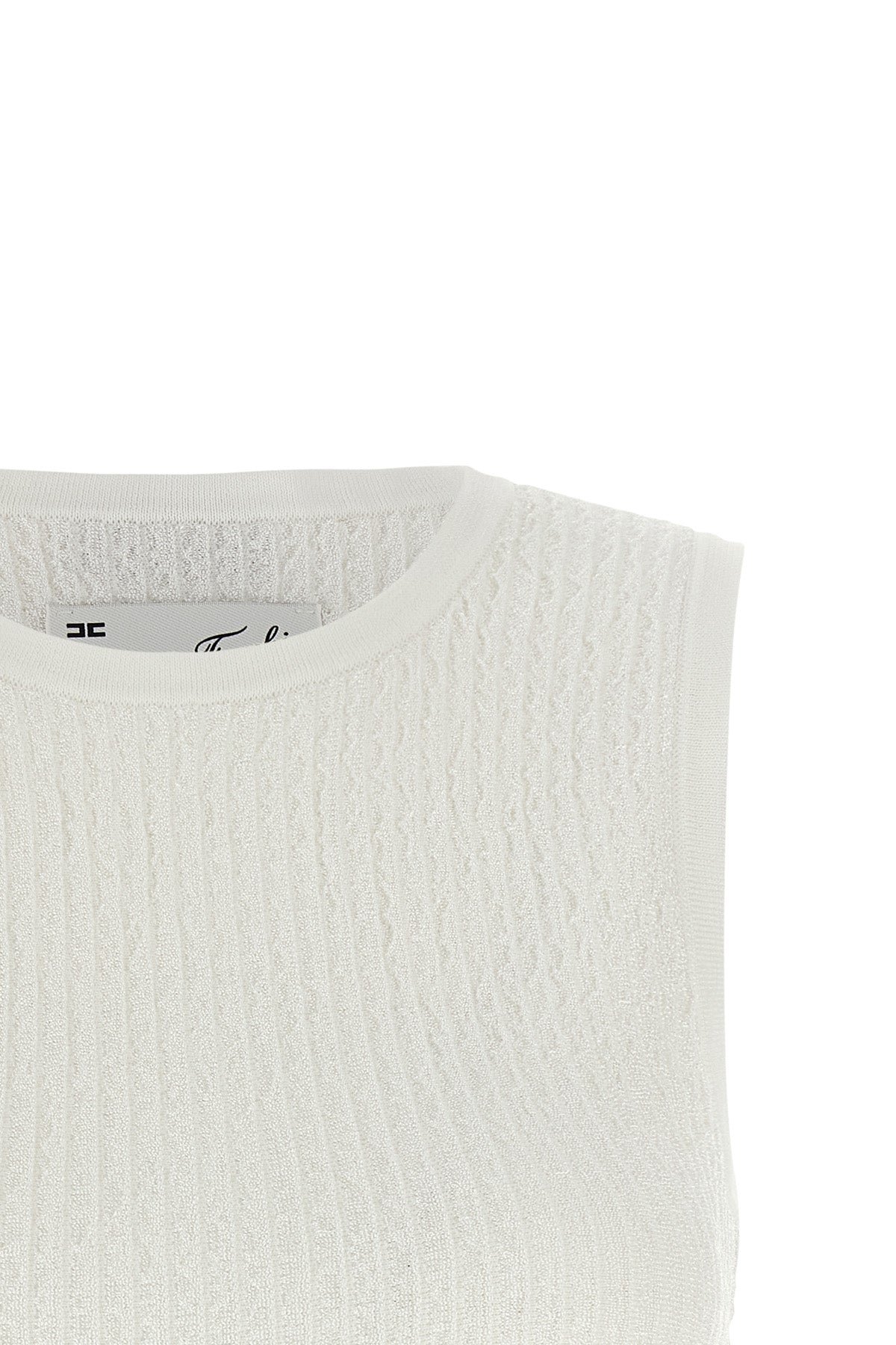 the elisabetta franchi top redefines the essentiality of the wardrobe through me