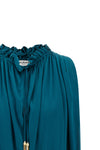 the sleeveless balmain top stands out for its fluid silhouette and impeccable ta