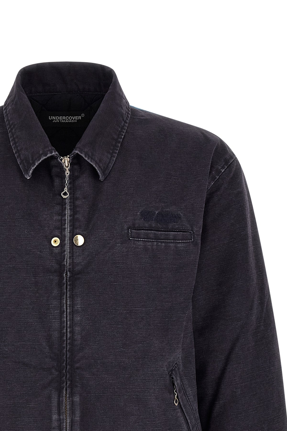 the blouson undercover in structured cotton canvas blends utilitarian aesthetics