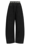 alexander wang denim pants redefine casual wear through a hybrid construction in