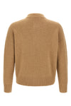 the ami paris camel cardigan redefines contemporary knitwear through relaxed vol