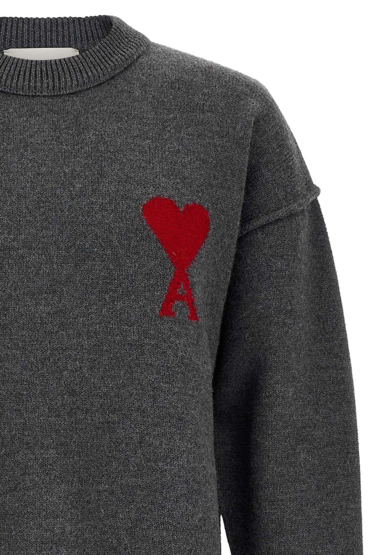 the ami paris crewneck sweater defines contemporary knitwear through a relaxed s