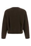 the vince cardigan redefines everyday knitwear through structured volumes and sa