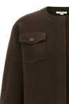 the vince cardigan redefines everyday knitwear through structured volumes and sa