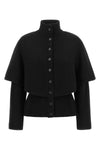 the vince cardigan redefines contemporary knitwear through a layered silhouette