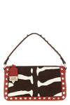 small rockstud shoulder bag in calf leather