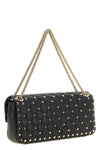 the valentino garavani rockstud spike medium shoulder bag redefines the codes