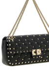 the valentino garavani rockstud spike medium shoulder bag redefines the codes