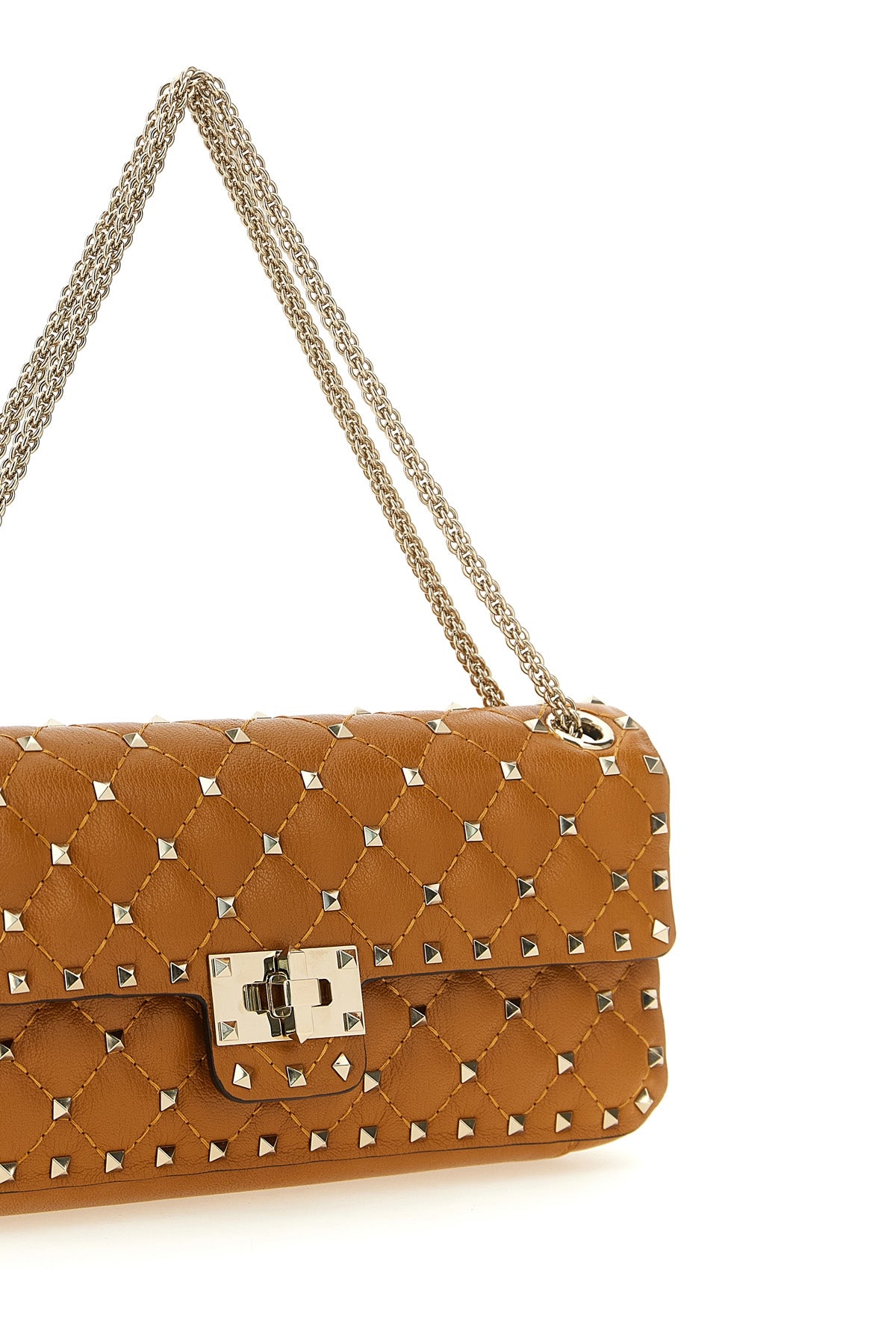 the valentino garavani rockstud spike medium shoulder bag embodies craftsmansh