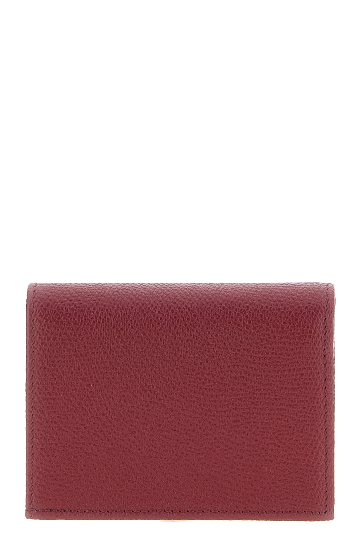 the valentino garavani portfolio represents the excellence of small leather good