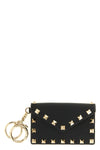the valentino garavani charm black hammered calf leather card holder defines the