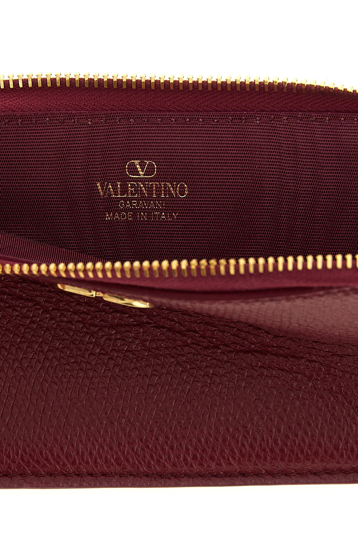 the valentino garavani coin purse and card holder sets a new standard of functio