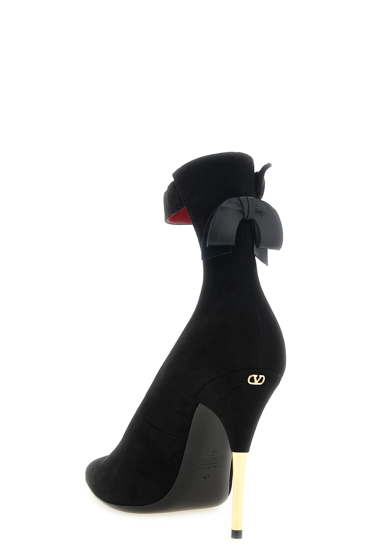 the valentino garavani fatale suede pumps embody a tapered and structured silh