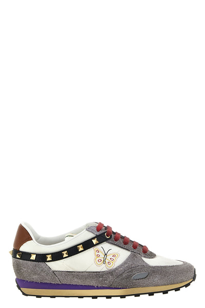 valentino garavani stud up sneakers redefine sporty aesthetics through a sophi