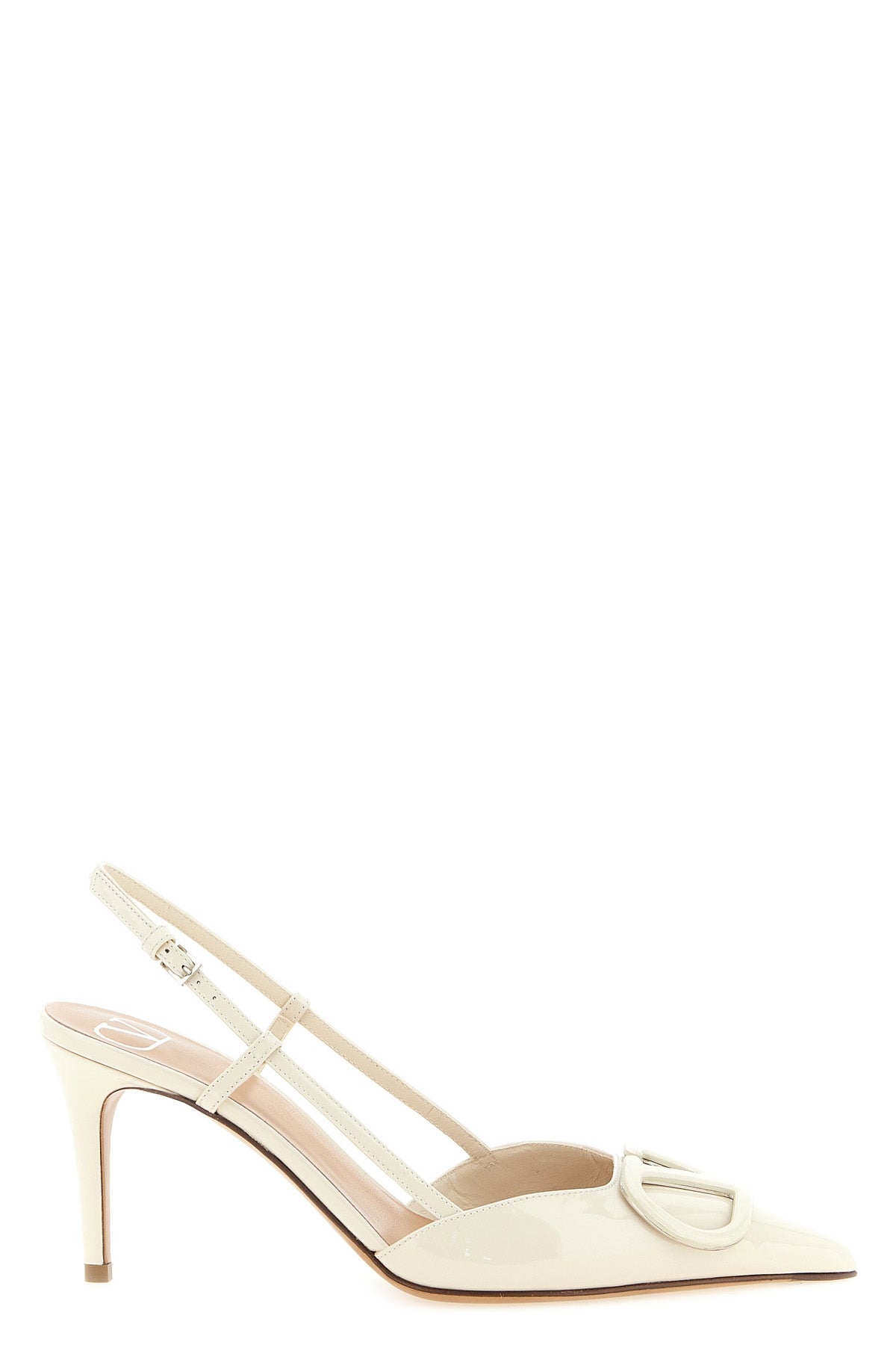 the valentino garavani slingback model pumps define a tapered silhouette through