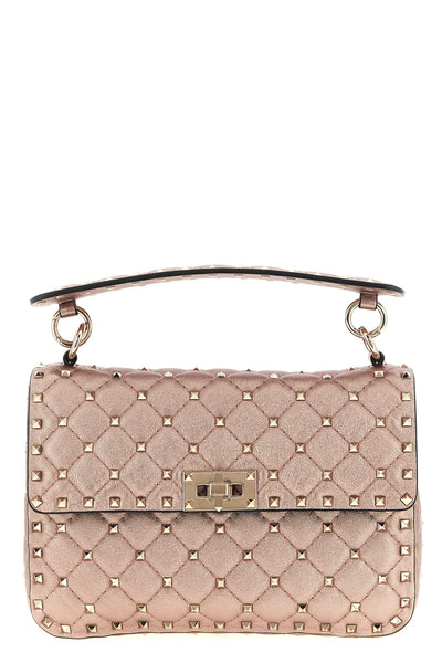 rockstud spike shoulder bag in laminated nappa leather