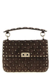 the valentino garavani rockstud spike shoulder bag in fine suede sets new standa