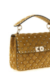 the valentino garavani rockstud spike shoulder bag sets new standards of craft