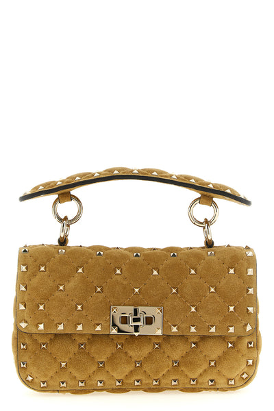 the valentino garavani rockstud spike small shoulder bag redefines the codes o