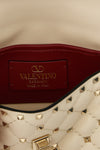 the valentino garavani rockstud spike small shoulder bag in soft lamb nappa is