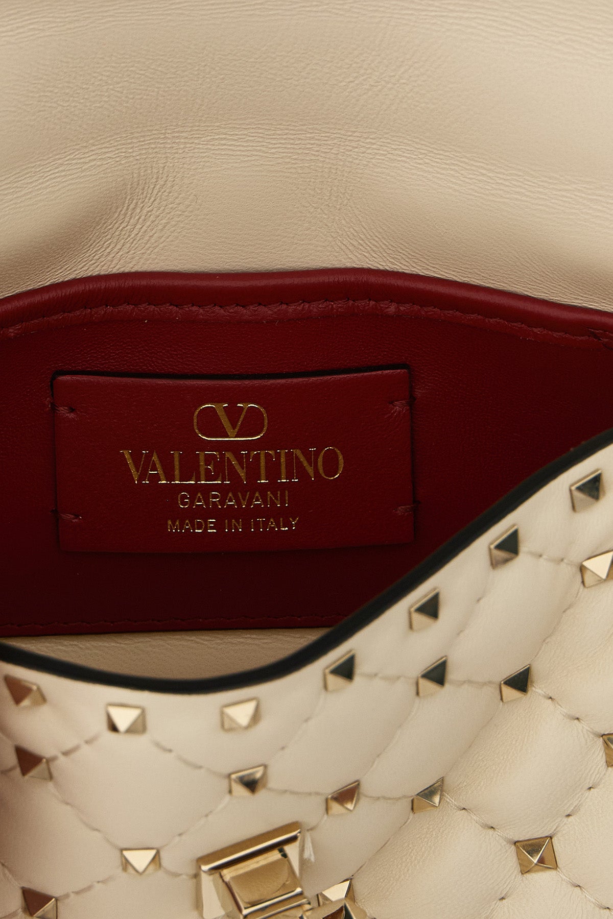 the valentino garavani rockstud spike small shoulder bag in soft lamb nappa is