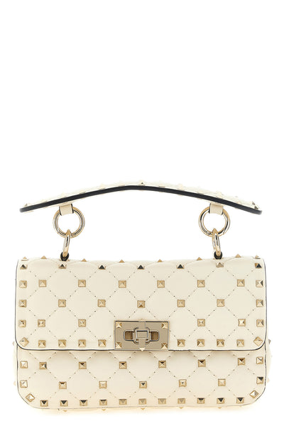 the valentino garavani rockstud spike small shoulder bag in soft lamb nappa is