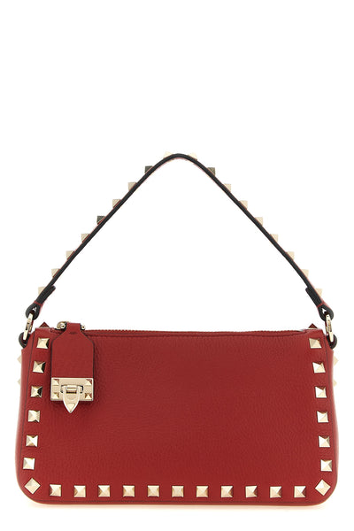 the valentino garavani small shoulder bag in red elk print calf embodies the ess