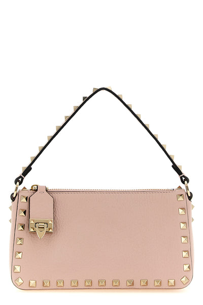 the valentino garavani rockstud small shoulder bag is made of fine grained cal