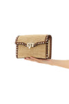 small rockstud crossbody bag in woven natural raffia