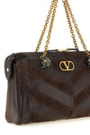 the valentino garavani panthea shoulder bag in dark brown calf leather defines