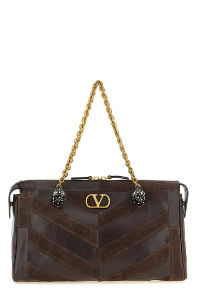 the valentino garavani panthea shoulder bag in dark brown calf leather defines
