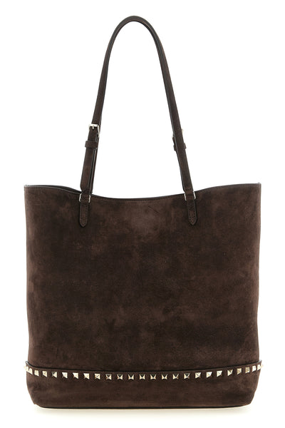 the valentino garavani medium tote bag in fine suede embodies a luxurious and st
