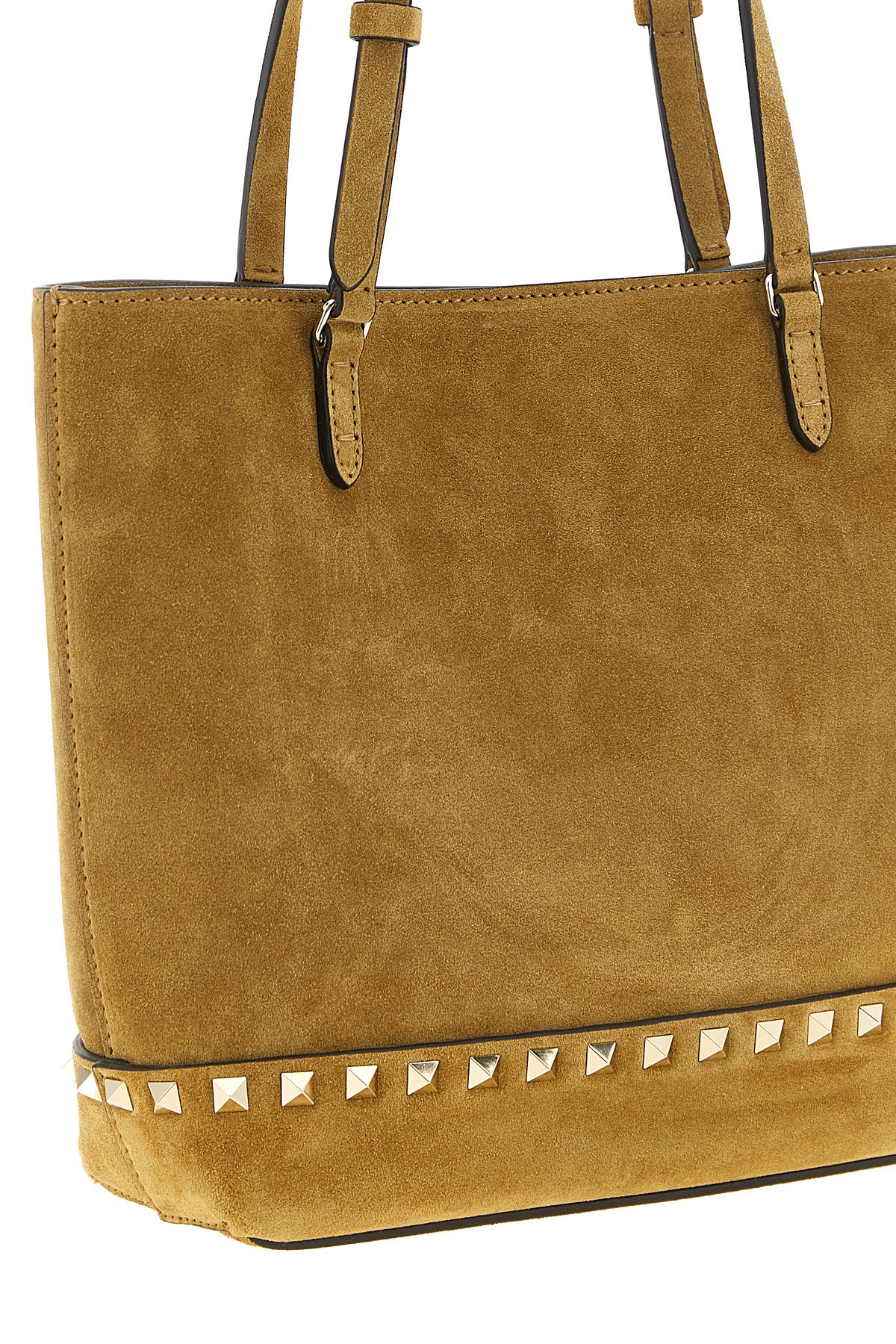 the small tote bag by valentino garavani defines a structured silhouette in fine