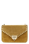 the valentino garavani rockstud small shoulder bag in beige suede stands out f