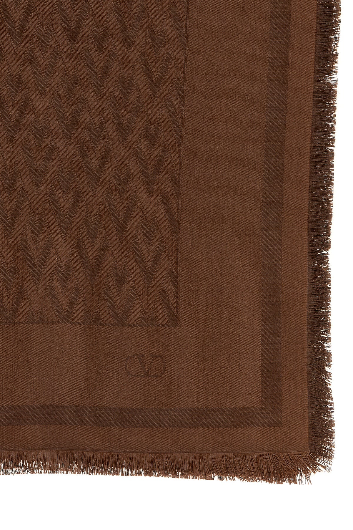 the valentino garavani shawl is made of a fine blend of silk and wool