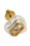 valentino garavani earrings define a romantic and structured aesthetic