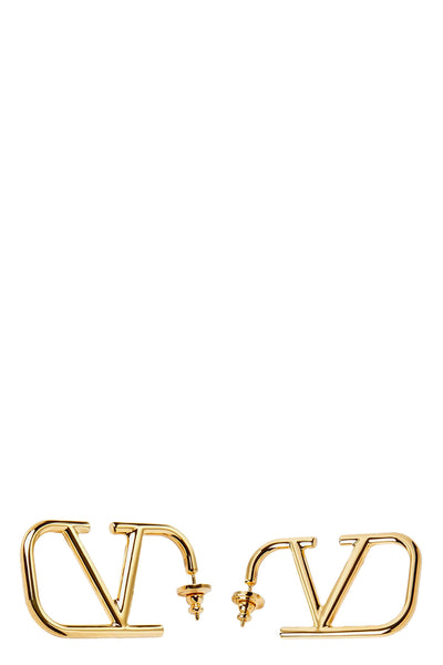 valentino garavani earrings define contemporary elegance through a precise archi