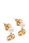 valentino garavani earrings define the face through a structured lobe design