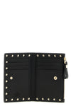 the valentino garavani rockstud cardholder in garnet calf leather represents an