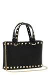 rockstud mini crossbody bag in garnet calfskin