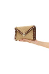rockstud mini crossbody bag in woven natural raffia